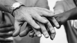 black and white photo of person s hands